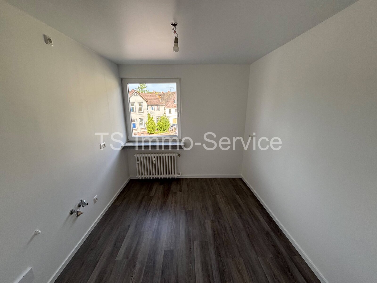 Sanierte 3-Zimmer-Wohnung mit Garage in zentrumsnaher Lage
